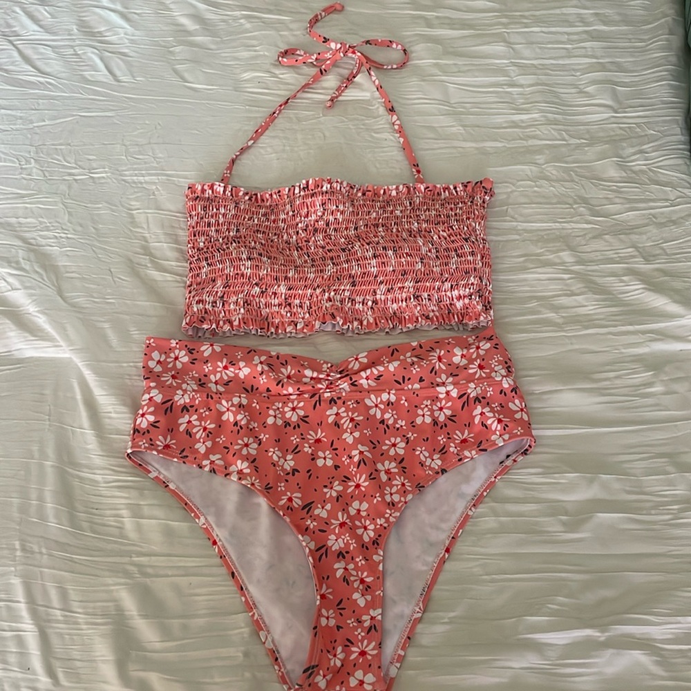 Adorable peachy pink two-piece swimsuit